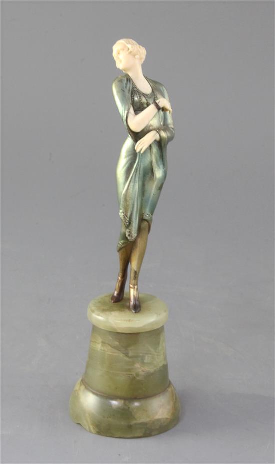 An Art Deco cold painted bronze and ivory figure of a Society lady, height 8.5in.